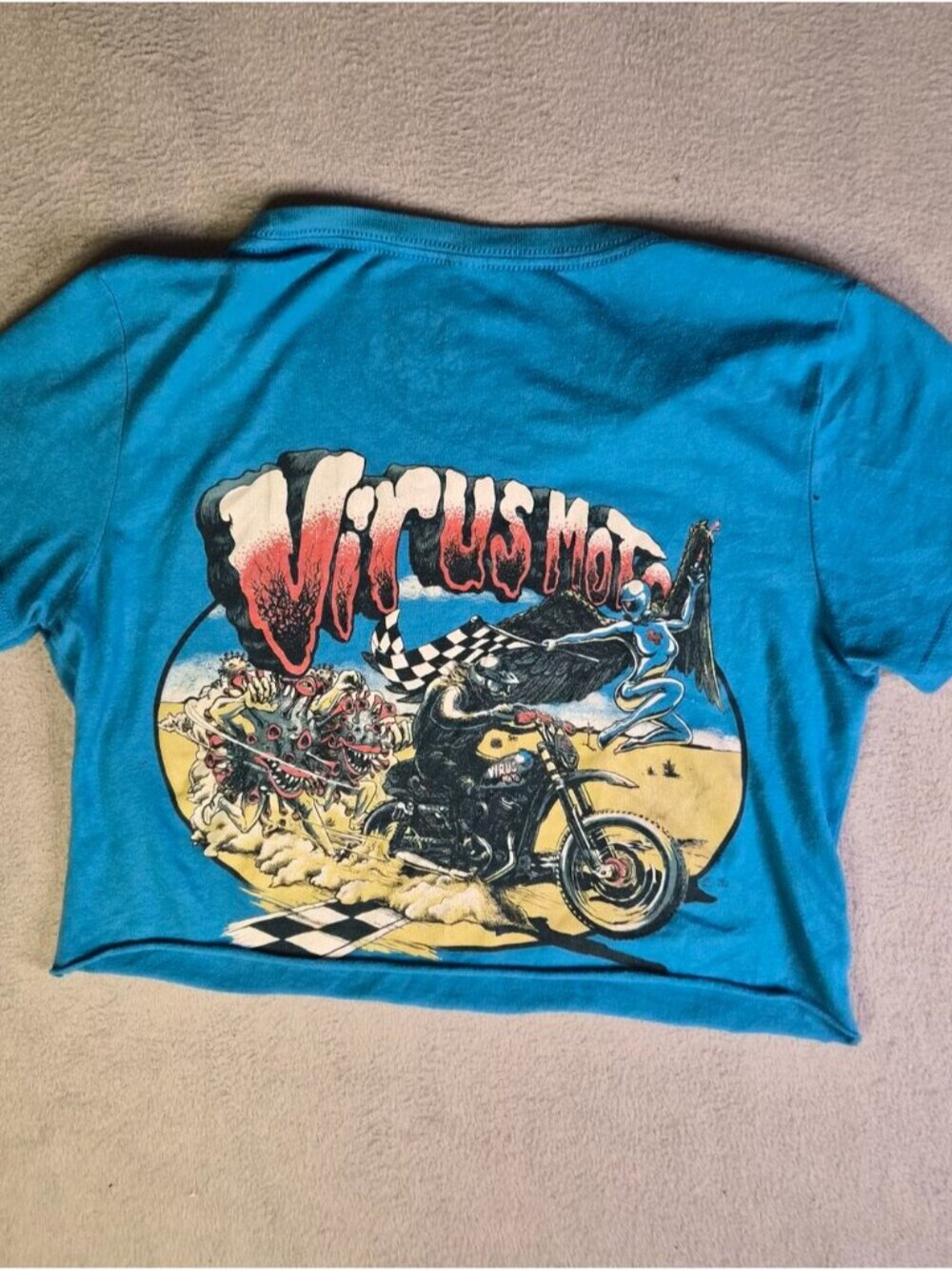 Blue cropped tee with graphic design. Size: M # - Picture 5 of 7